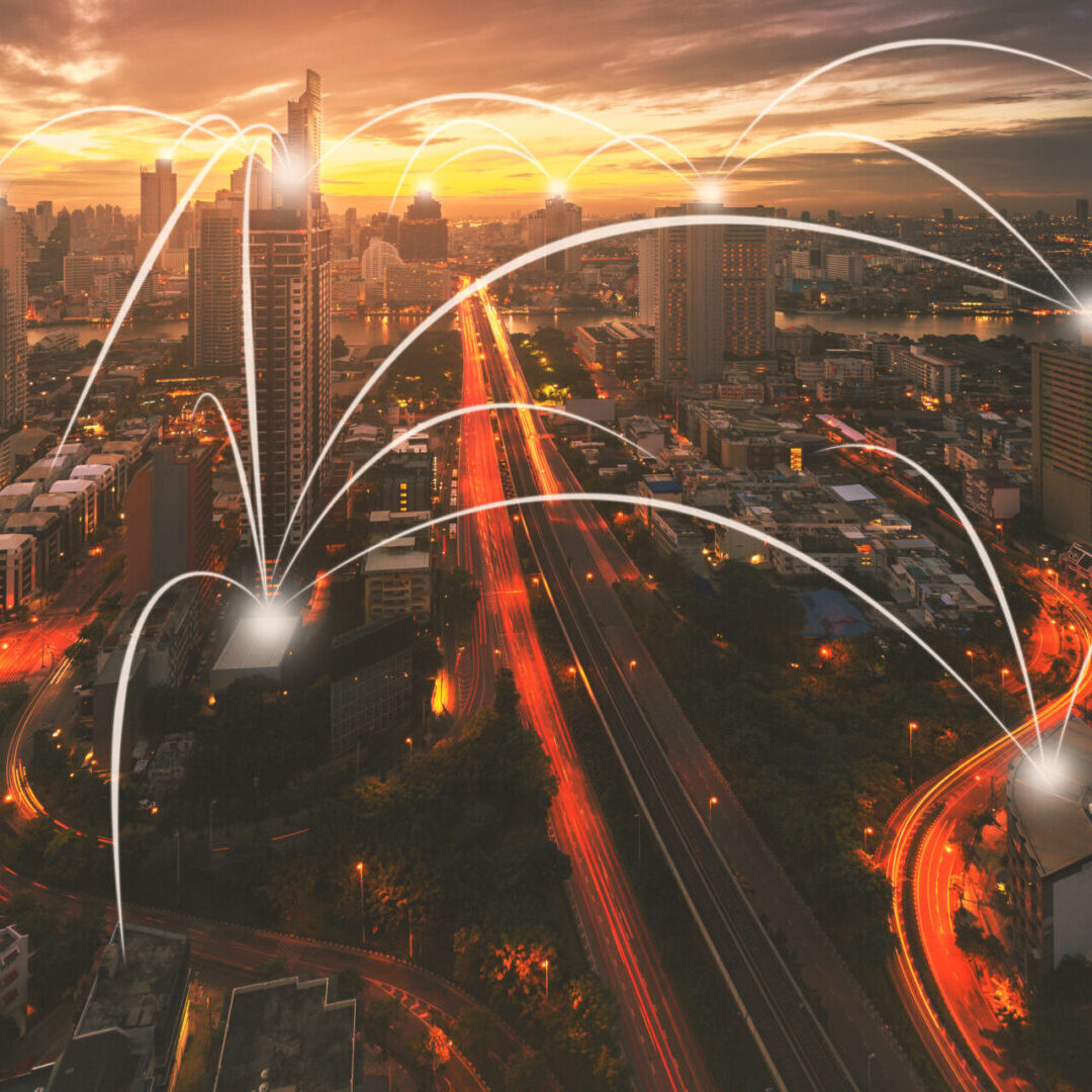 Network,And,Connection,Technology,Concept,With,City,Background,In,Sunrise